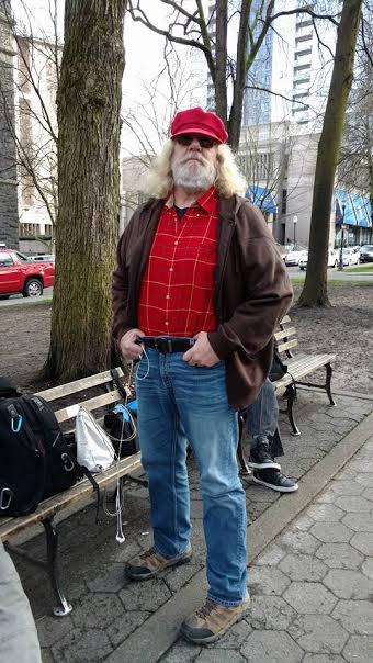 Meet Ralph! Here he is on one of his many "pot shop" walks this past summer. Ralph lost 20 pounds he did so much walking!